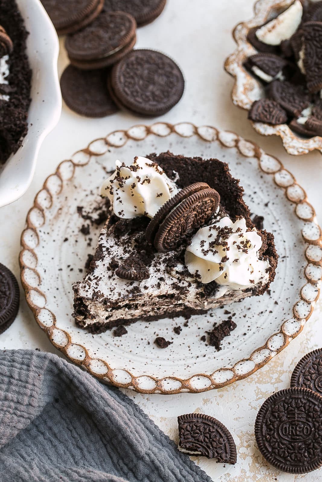 A small plate with a slice of No Bake Oreo Pie.