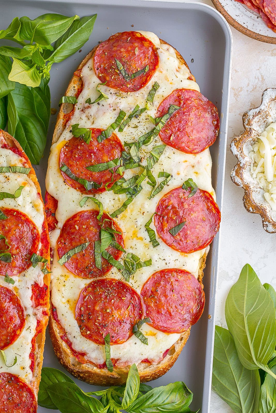 Sourdough Bread Pizza with pepperoni and fresh basil.