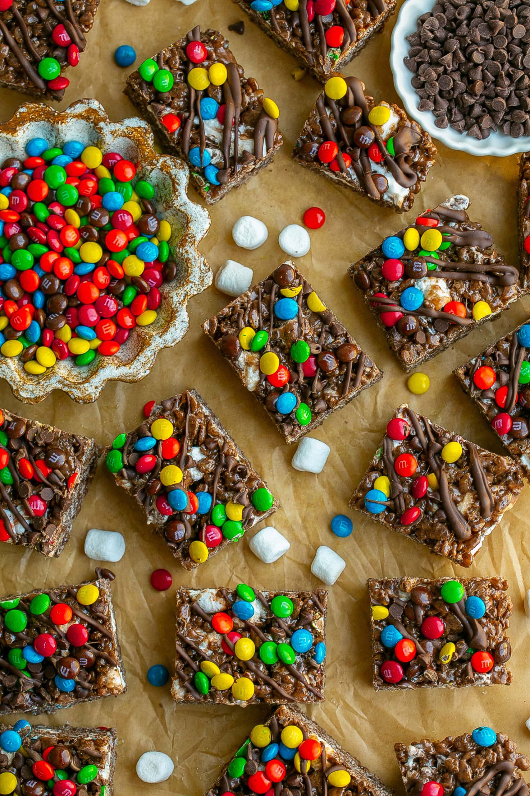 M&M Chocolate Rice Krispie Treats on parchment paper.