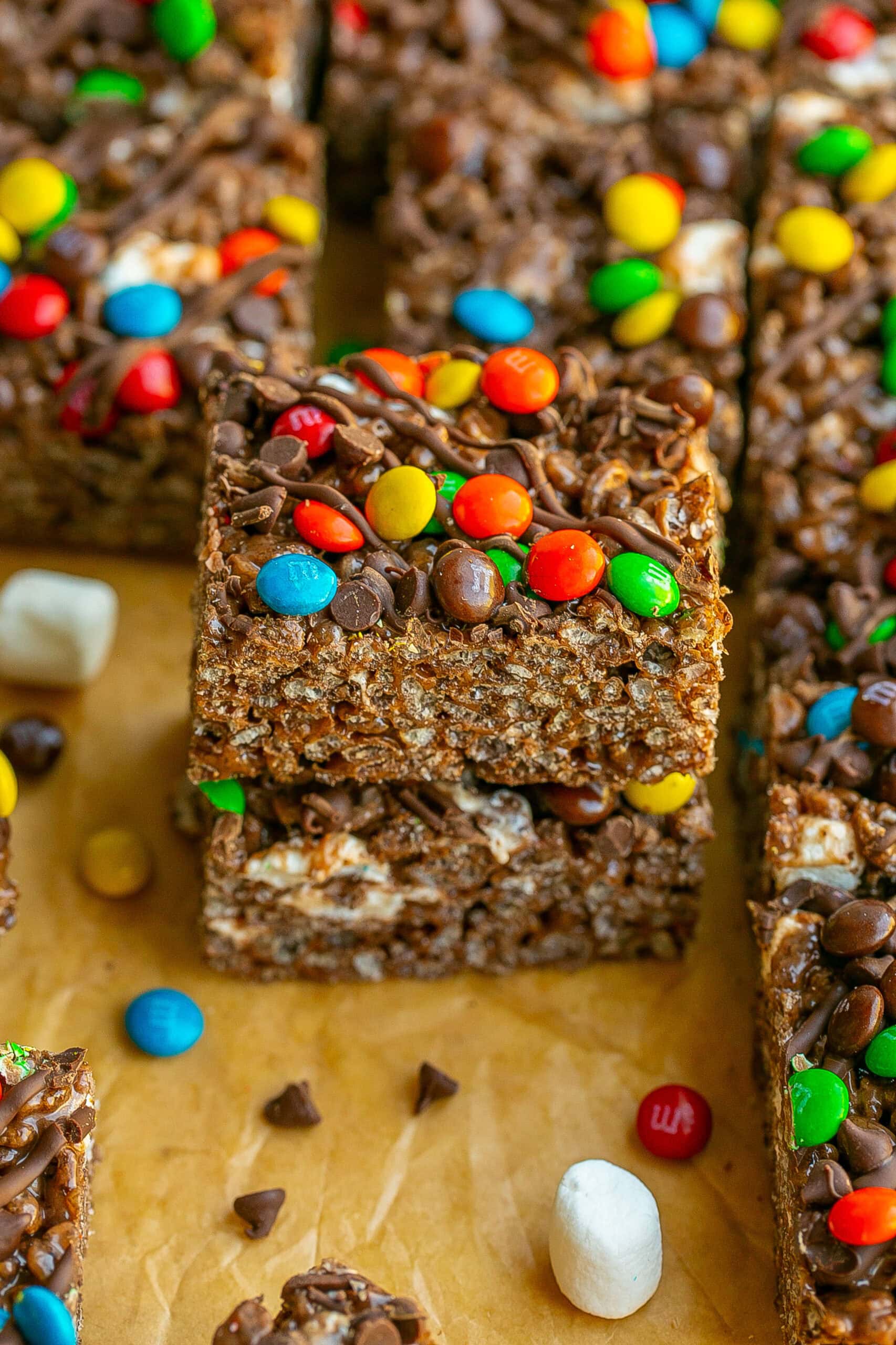Stack of gooey M&M Chocolate Rice Krispie Treats.
