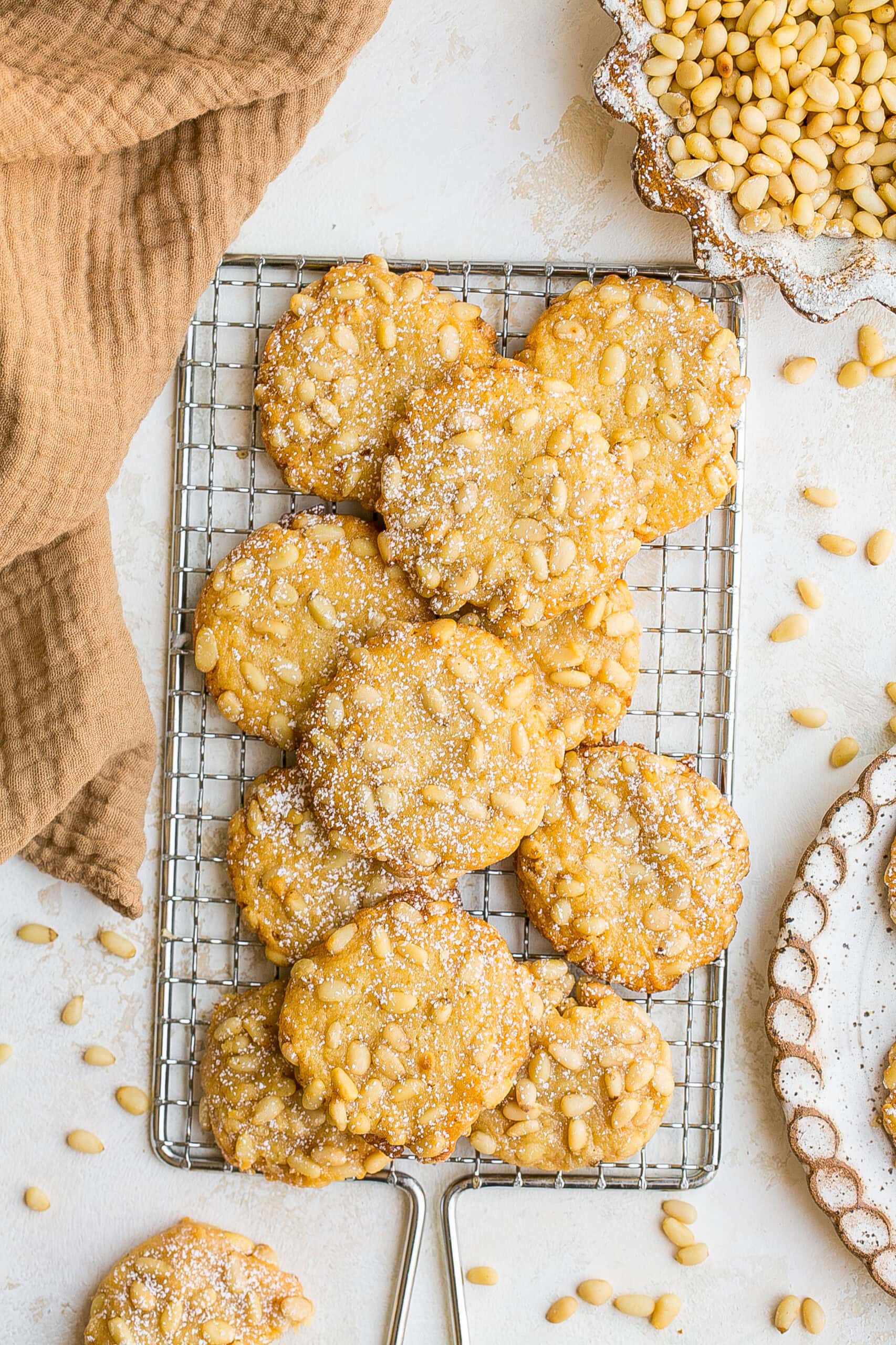 Pignoli Cookies on cooling rack.