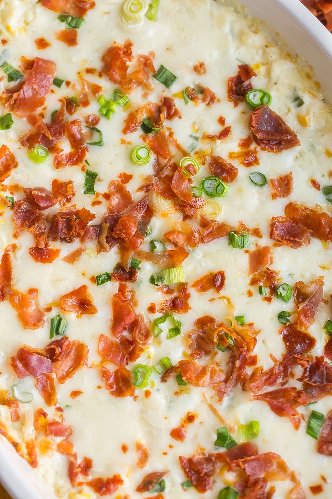 Baked cheese dip close up.