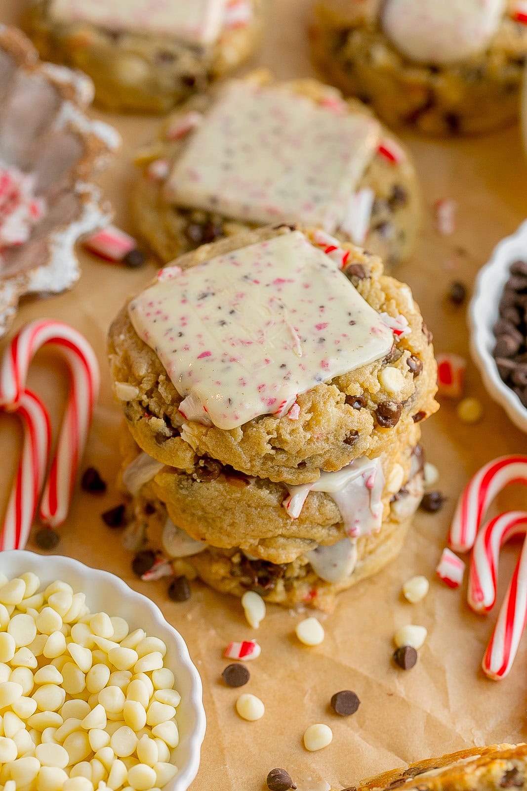 Stack of Peppermint Chocolate Chip Cookies with candy canes.