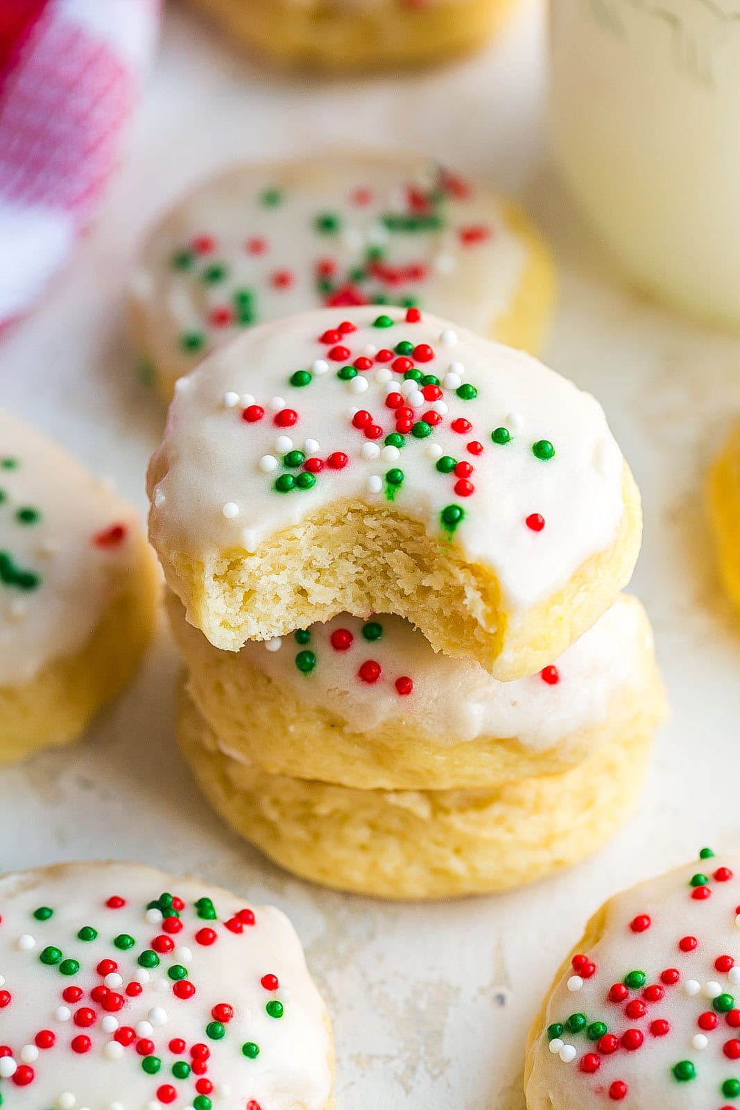 Stack of Sour Cream Cookies with bite mark.