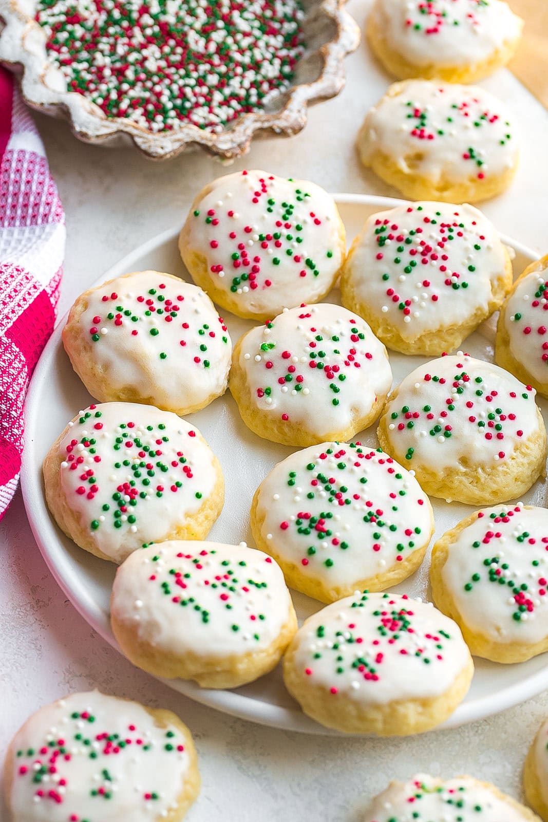 Plate full of Christmas Sour Cream Cookies.