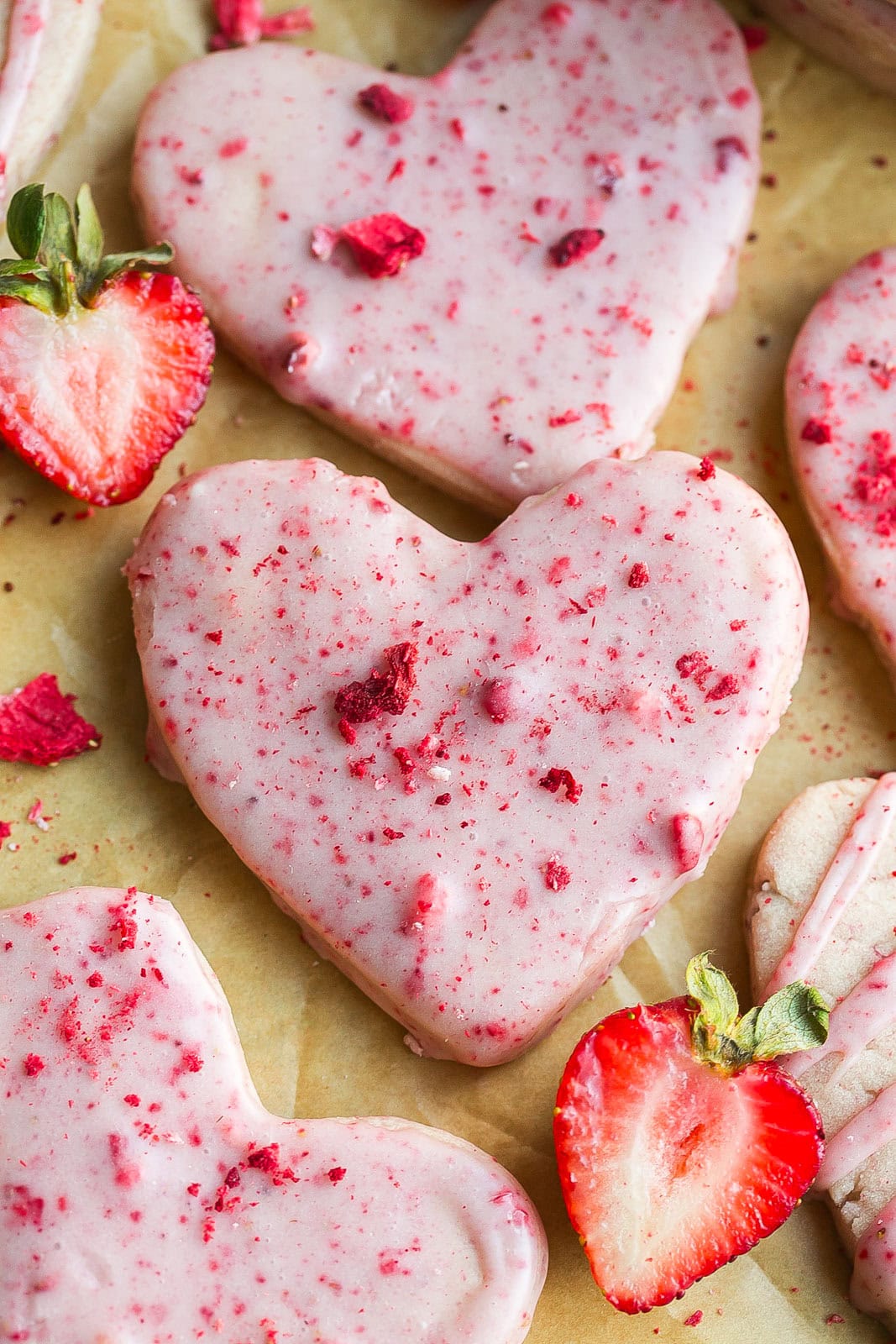 Close photo of a Strawberry Shortbread Cookie with icing.
