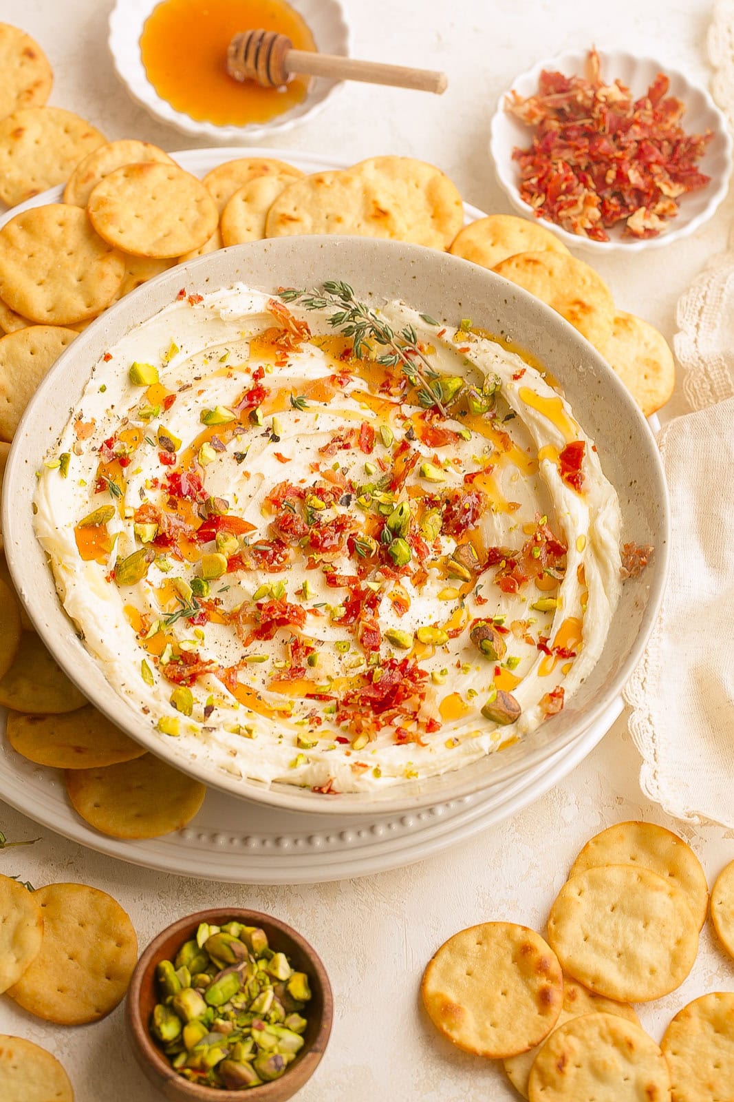 Whipped Brie with Hot Honey in a bowl with crackers.