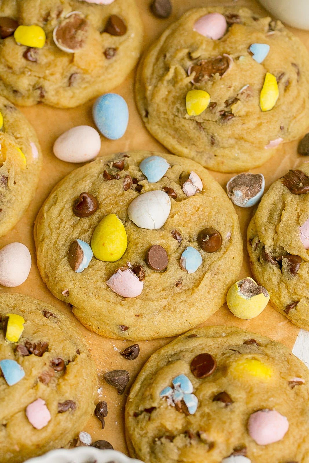 Close up of bakery-style Easter cookies with Cadbury Eggs.