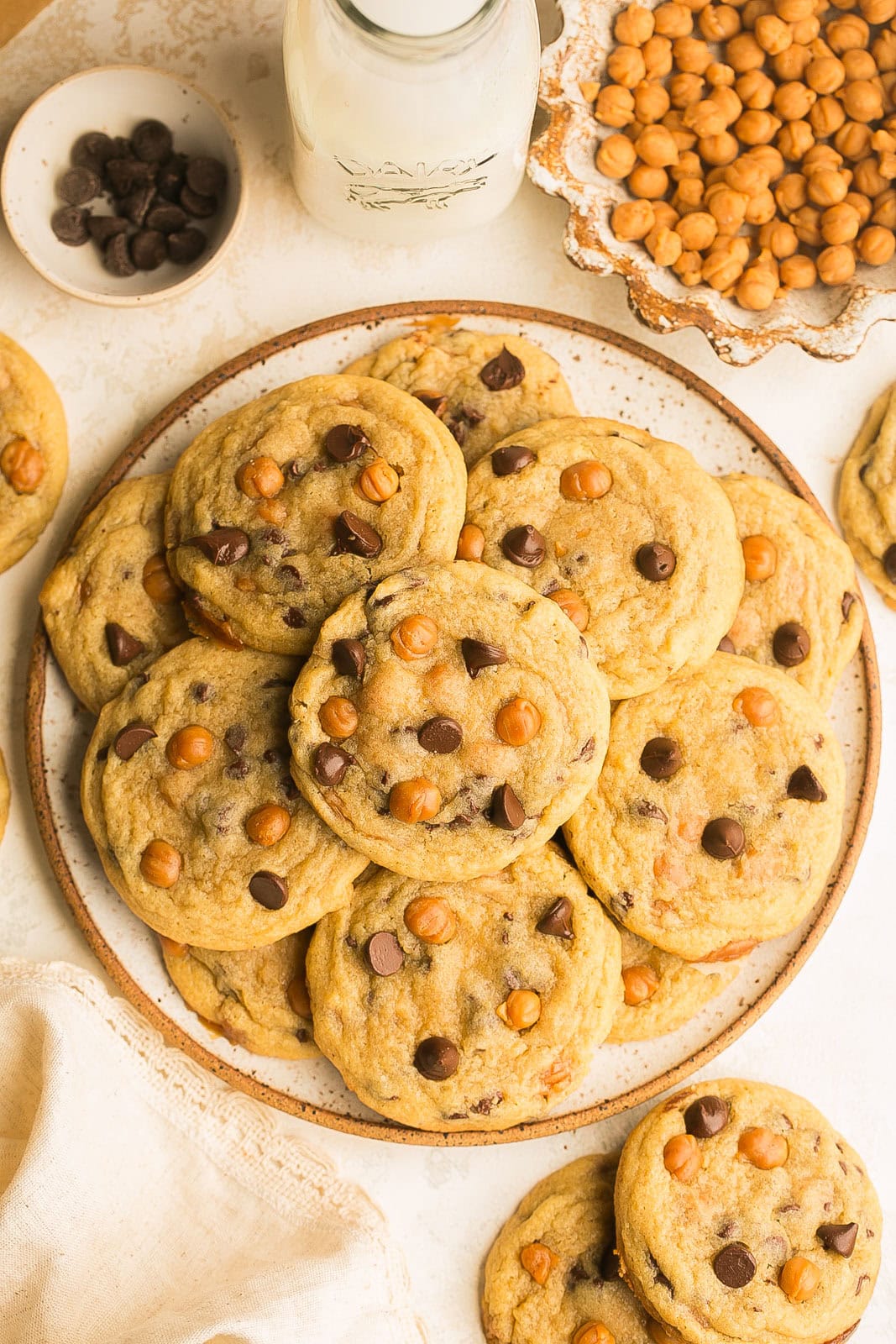 A plate full of fresh baked Caramel Chocolate Chip Cookies.