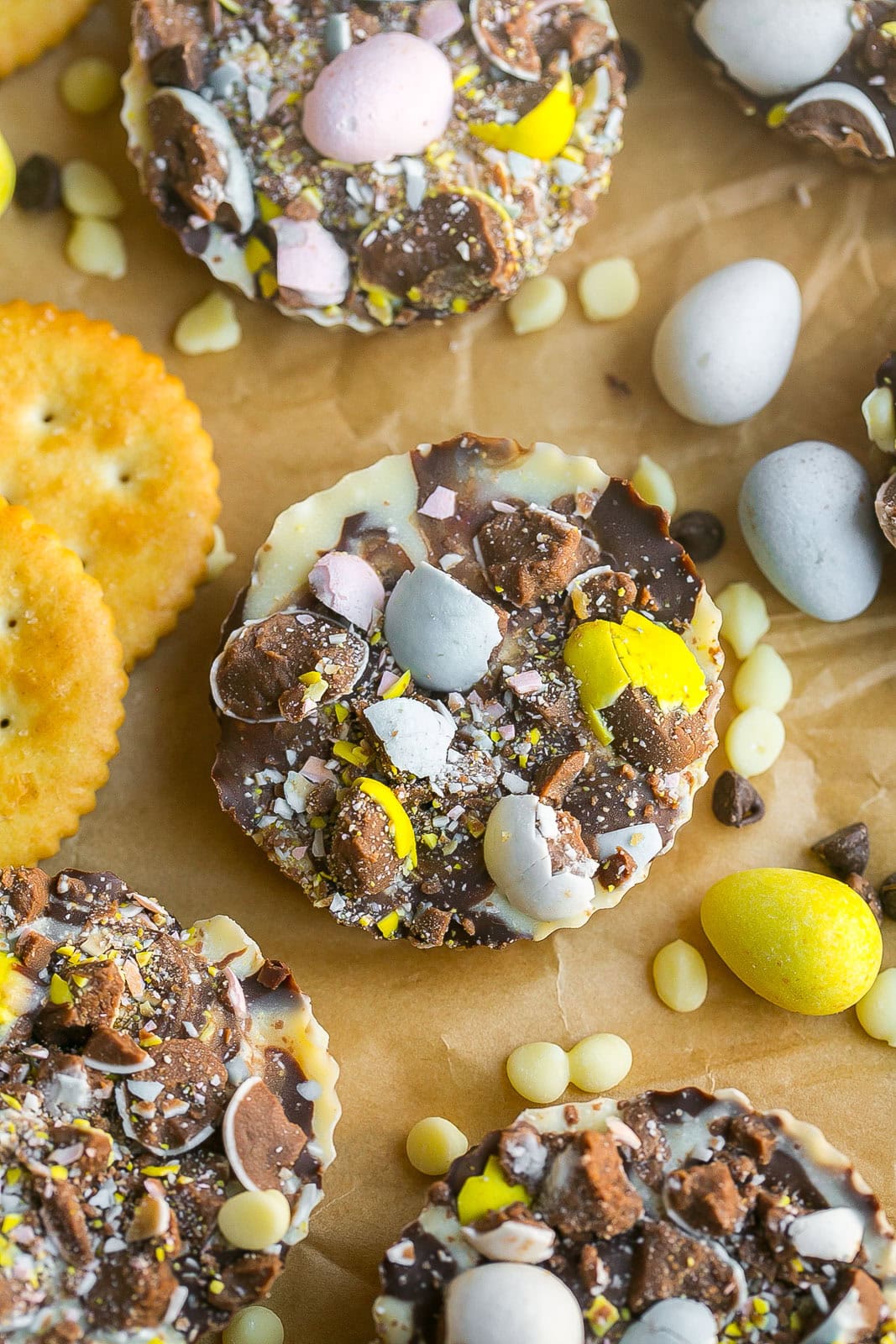 Ritz Cracker Cookies with Cadbury Eggs on top.