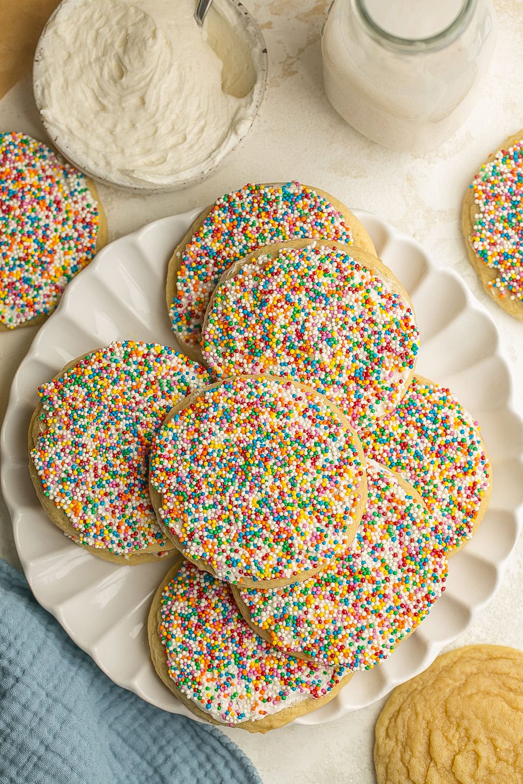 A white plate full of Dot Cake Cookies.