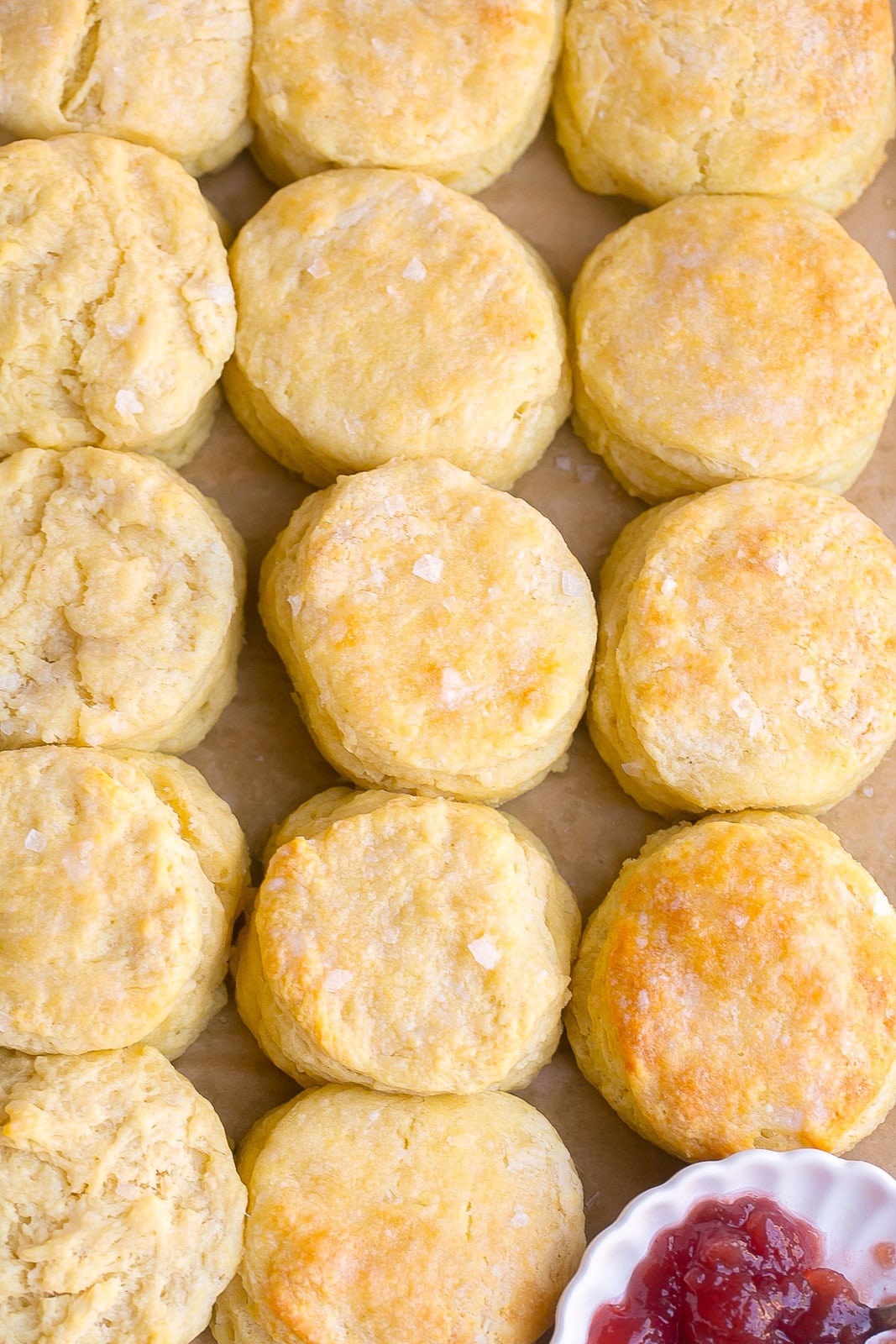 Overhead view of soft, flaky Homemade Buttermilk Biscuits fresh from the oven.