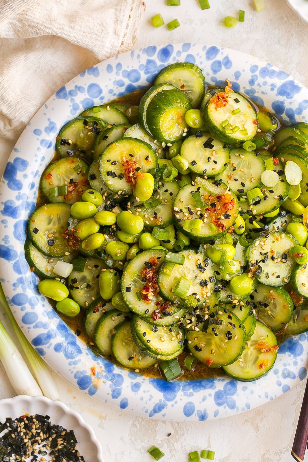 Protein-packed Edamame and Cucumber Salad made with fresh cucumbers, edamame, green onions, and a homemade Asian-inspired dressing.