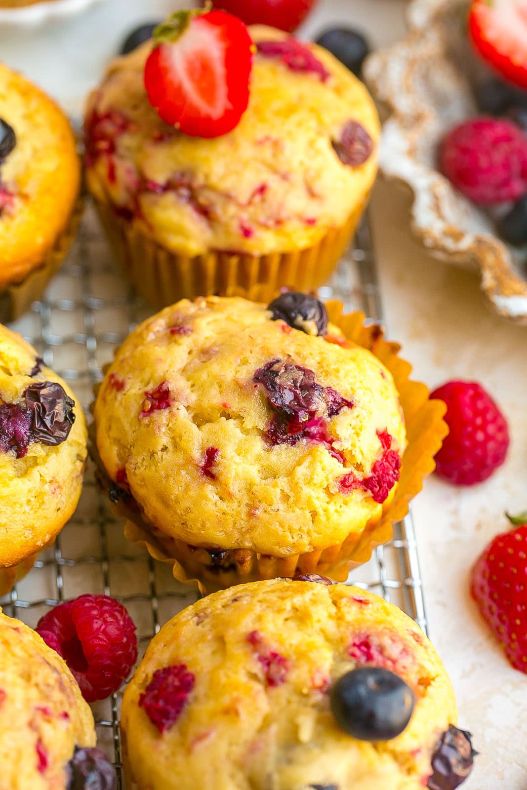 Easy Mixed Berry Muffins with fresh berries, perfect for breakfast or brunch.