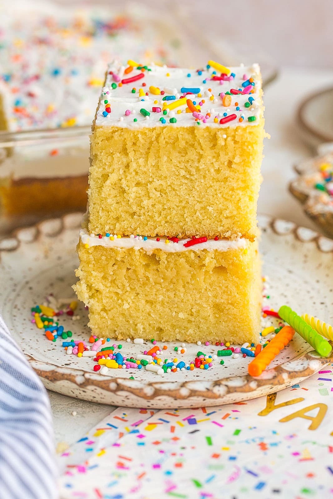 Easy Vanilla Sheet Cake made from scratch with a tender crumb and smooth vanilla buttercream frosting.