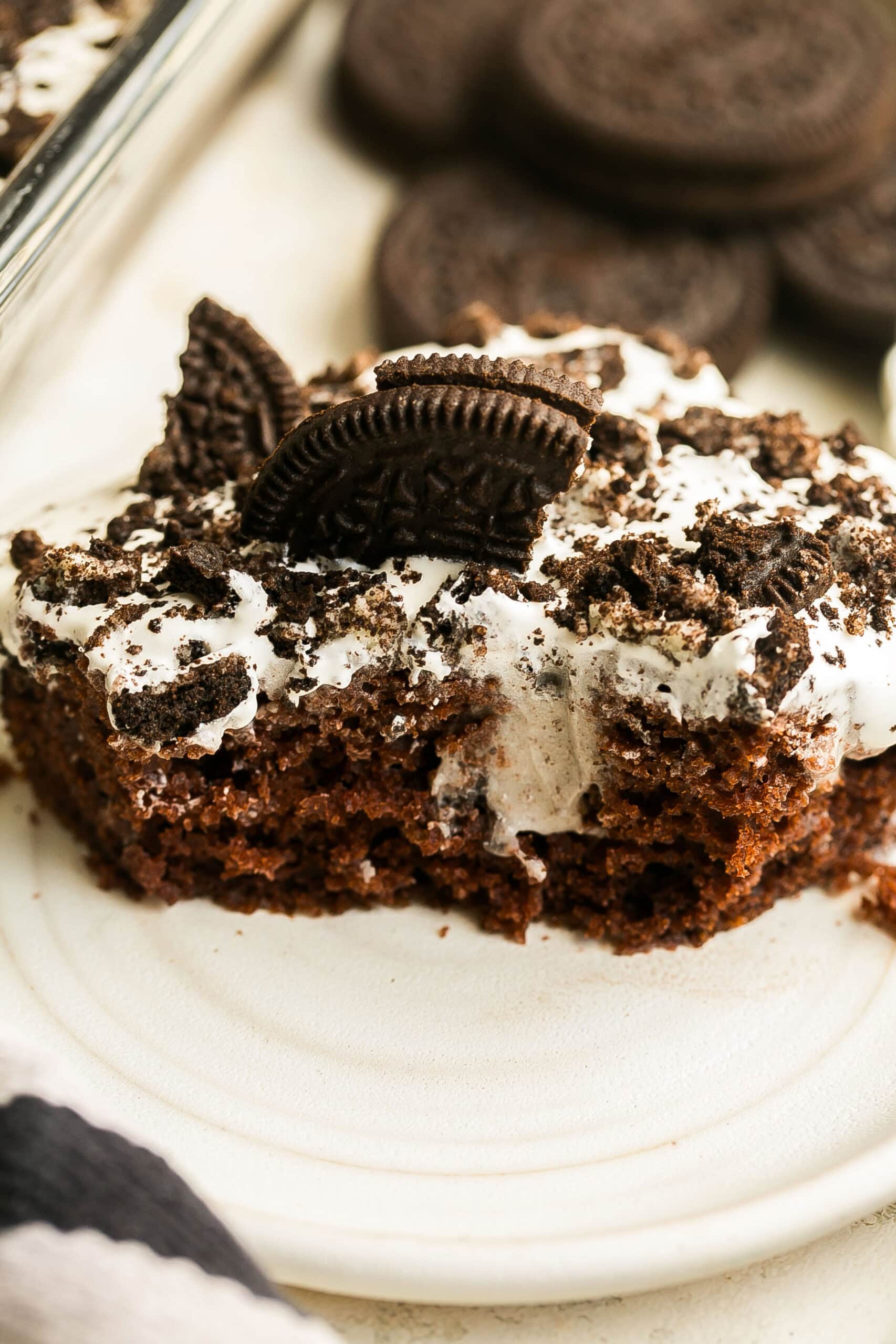 The inside of an easy Oreo Cake with cookies and cream filling.